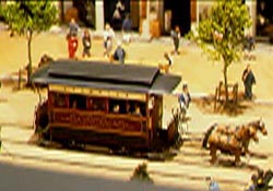 Horse-drawn carriage on rail